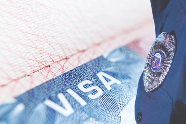 photo of visa and police bade