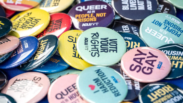 ACLU-VT buttons on table at an event