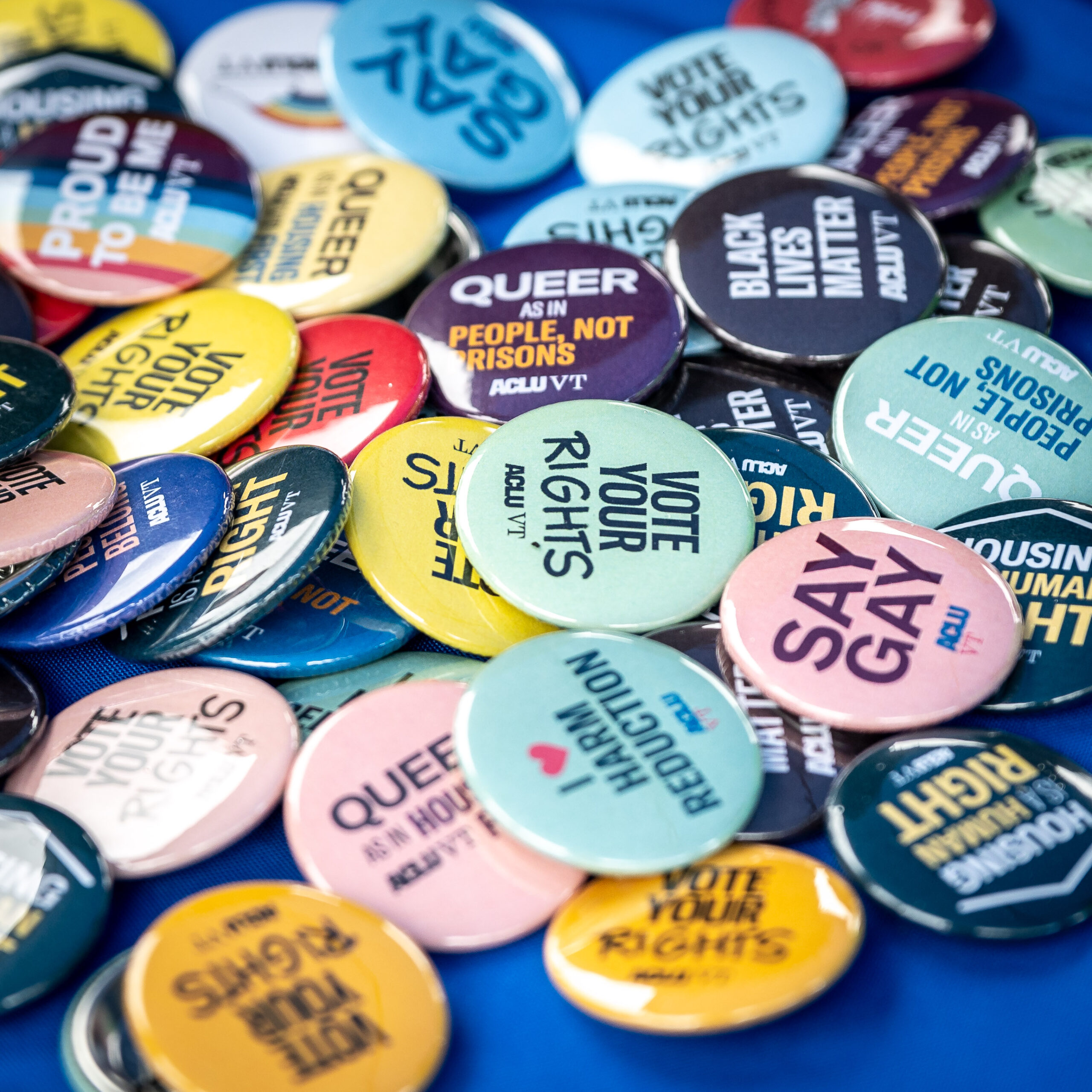 ACLU-VT buttons on table at an event