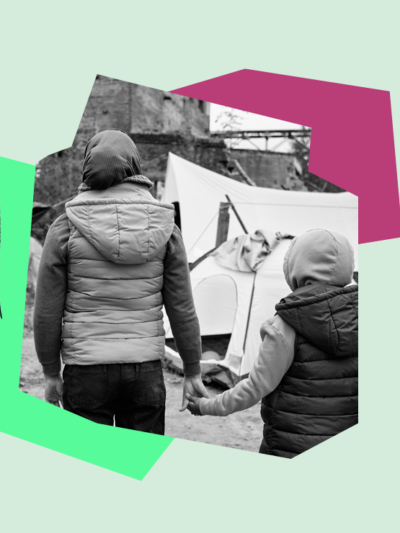 parent with child holding hands and homeless by a tent outisde