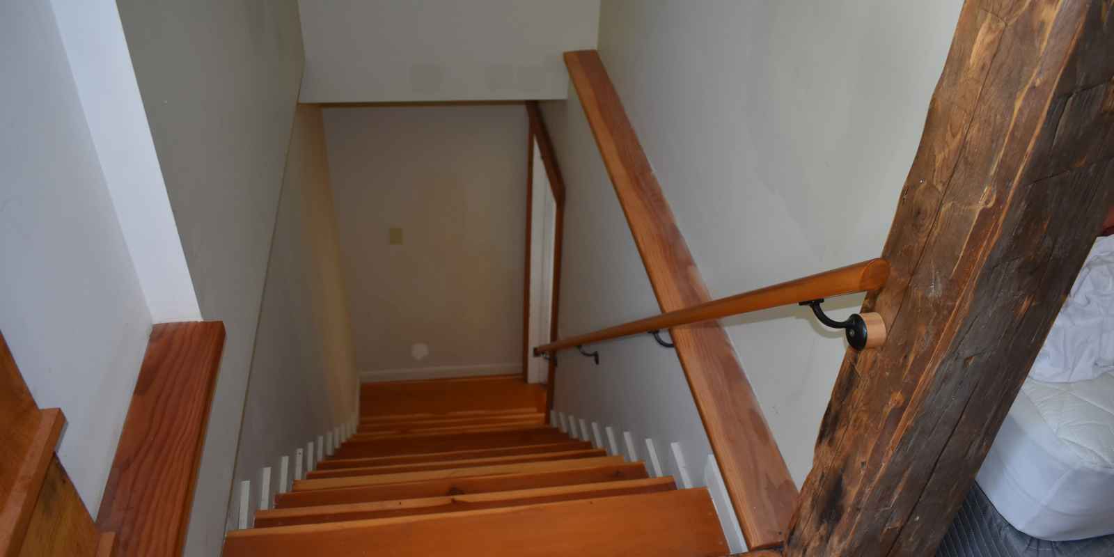 Photo looking down stairwell from the landing where officers wrestled J.A. to the ground